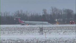 American Airlines plane slides of taxiway at New York airport amid snowy weather - Fox News