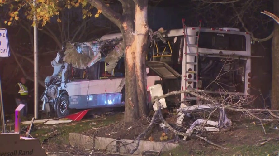 Police and emergency responders at scene of bus crash near Brandeis University