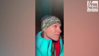 US military Olympian Kelly Curtis expresses pride in representing America