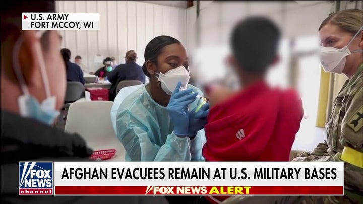 Thousands of Afghans stranded on US military bases as winter approaches