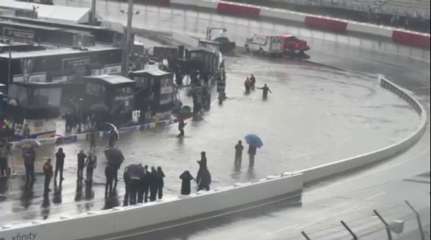 NASCAR Driver Defies Flooded Pit Road with Epic Belly Flop