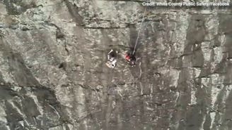 Firefighter pulls off daring rescue of free climber stranded on mountain face