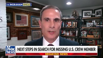 Search continues for missing American crew member as the sun rises in Tehran