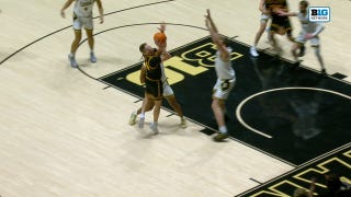 Iowas' Bennett Stirtz Drives Past His Defender for an And-One Layup vs Purdue