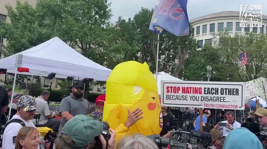 Protesters gather outside Washington, D.C. courthouse as Trump's arraignment looms