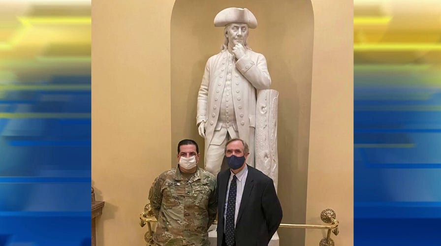 National Guardsman takes picture with all 100 US senators