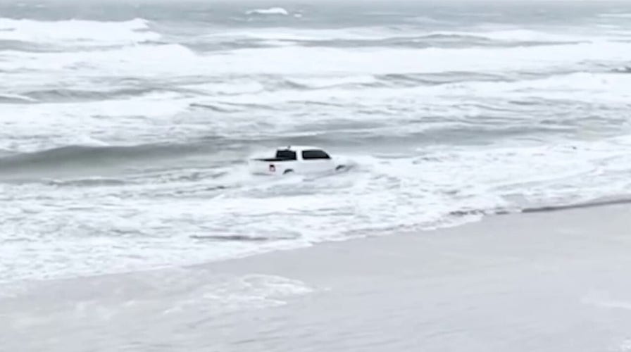 Florida man drives vehicle into ocean, ignoring closed access gate