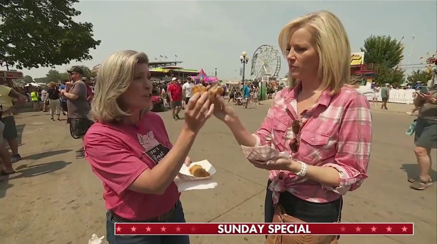 Sen. Ernst and Shannon Bream try deep fried foods at the Iowa state fair