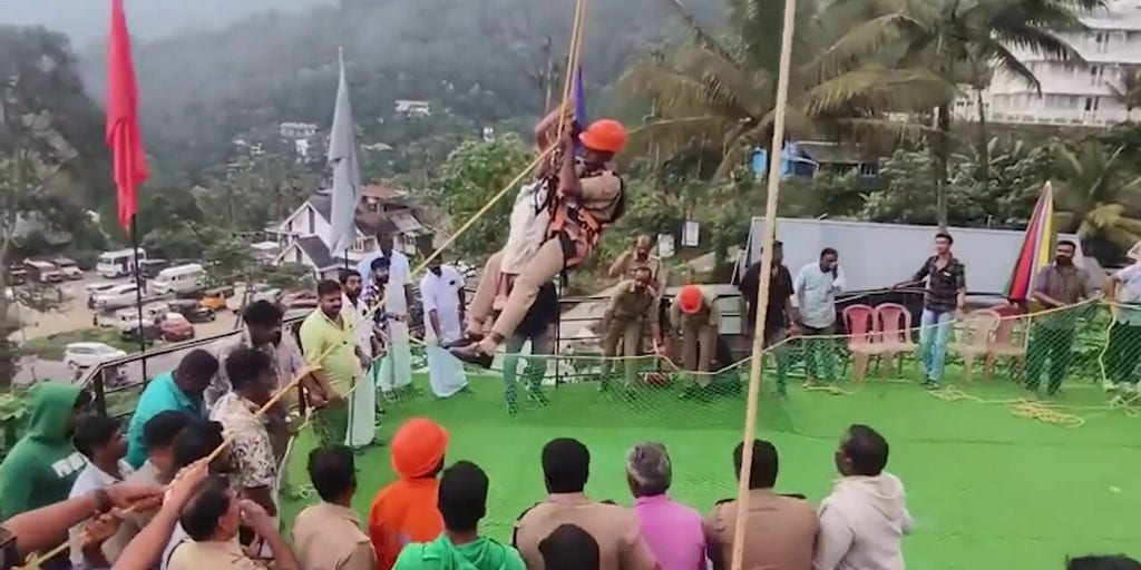 Rescuers leap into action after sky-dining attraction malfunctions 120 feet in the air