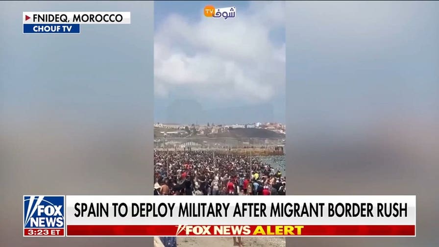 Spain deploys military after thousands of migrants breach border
