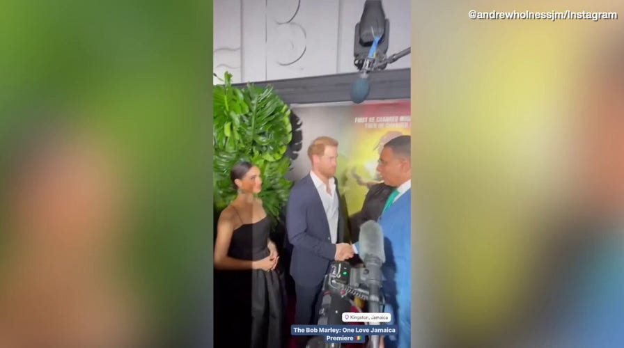 Prince Harry, Meghan Markle make rare public appearance at movie premiere