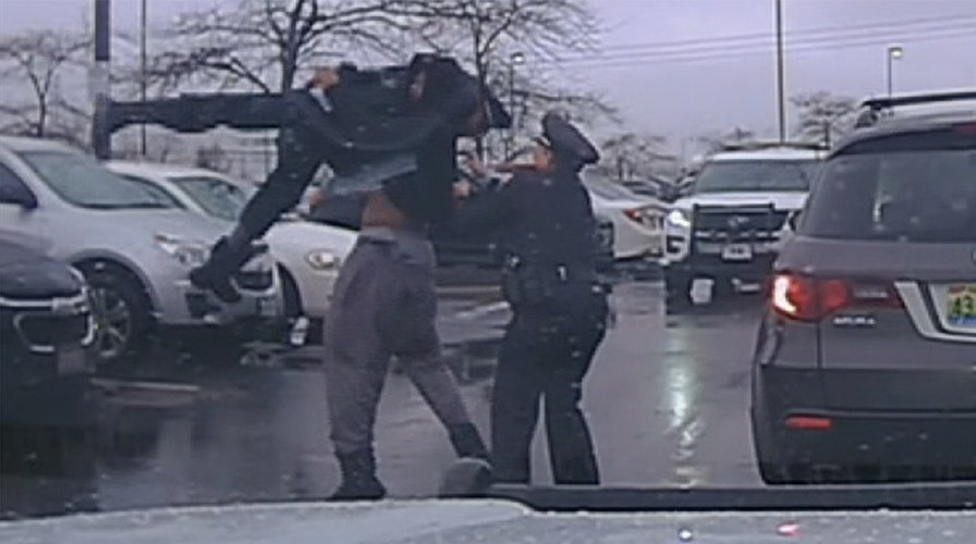College football player body slams Ohio police officer, video shows