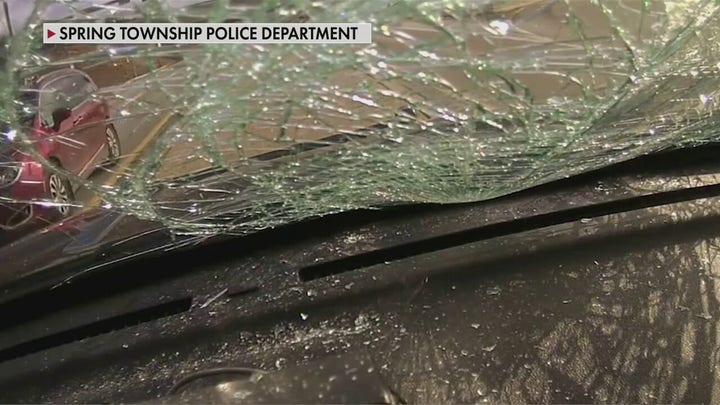 Tire slams into windshield of Pennsylvania police cruiser