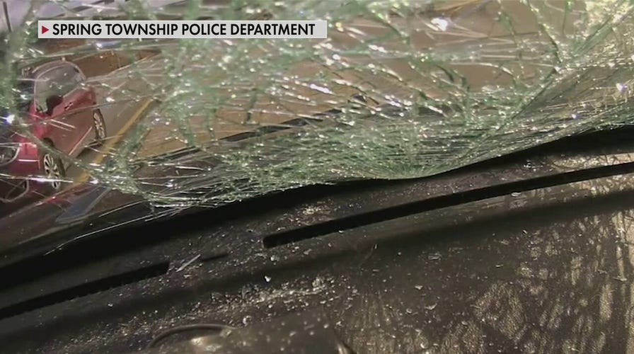 Tire slams into windshield of Pennsylvania police cruiser