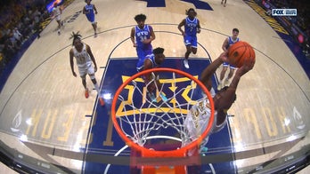 West Virginia's DJ Thomas throws down dunk, extending lead over BYU