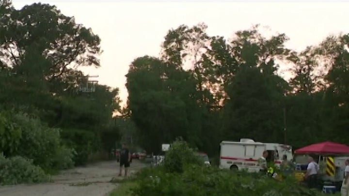 19 injured when tree falls on garage during storm