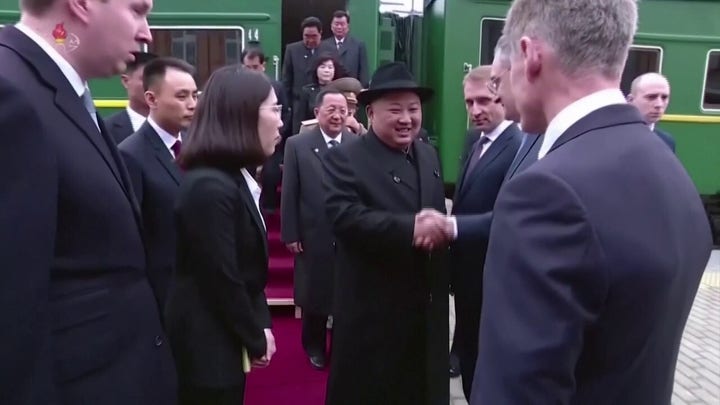 Kim Jong Un riding on his armored train in 2019.