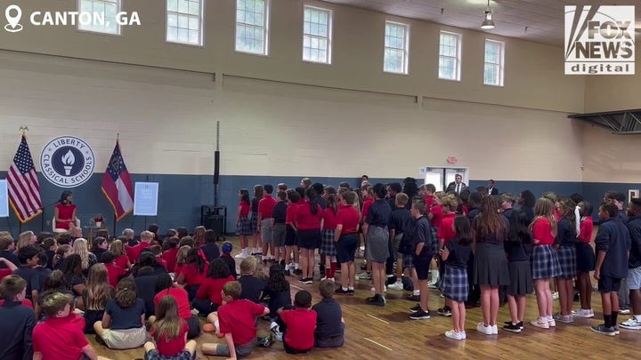 Students at Liberty Classical Schools recite a poem for Usha Vance, second lady