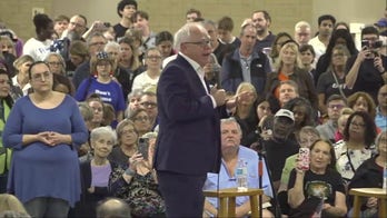 Tim Walz says a shadow government is needed to counter Trump