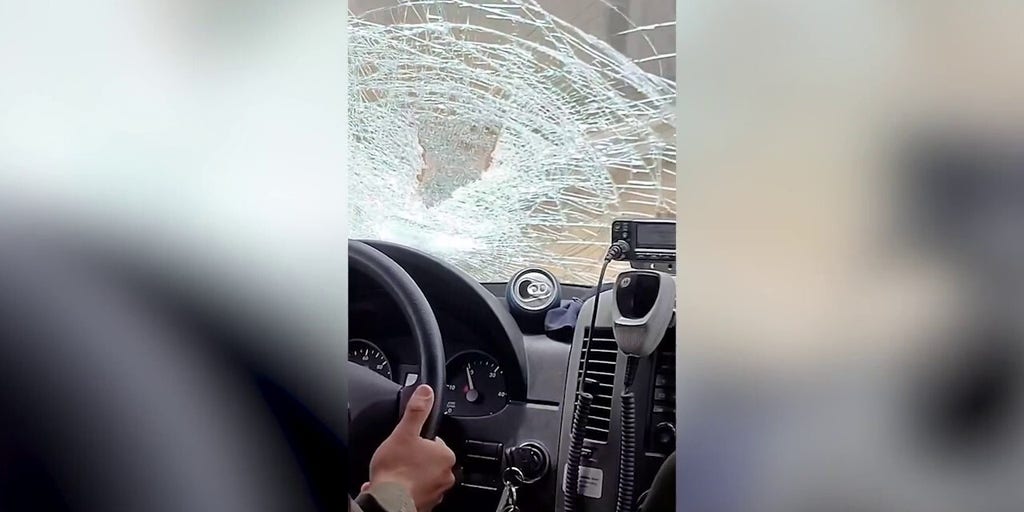 Border Patrol agents' government vehicle pelted with rocks