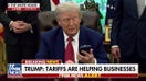 President Trump's phone goes off during executive order signing: 'It's only a congressman'