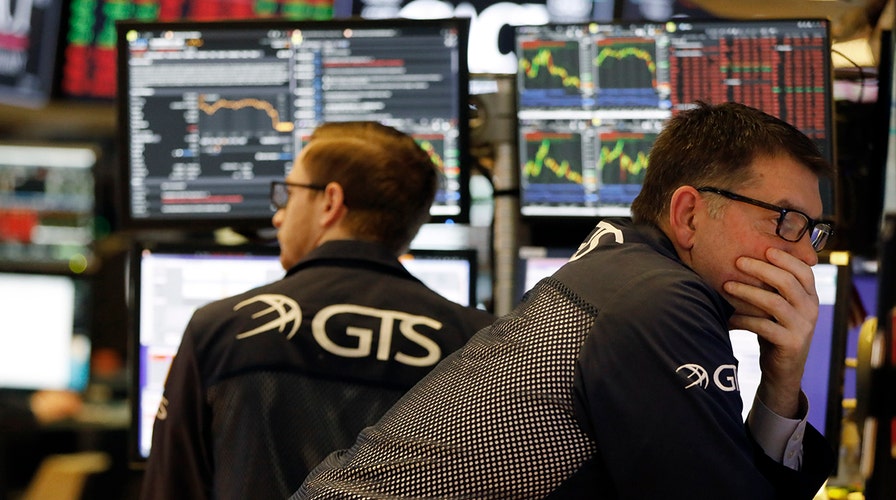 Dow plunges 1,400 points as WHO declares coronavirus outbreak a pandemic