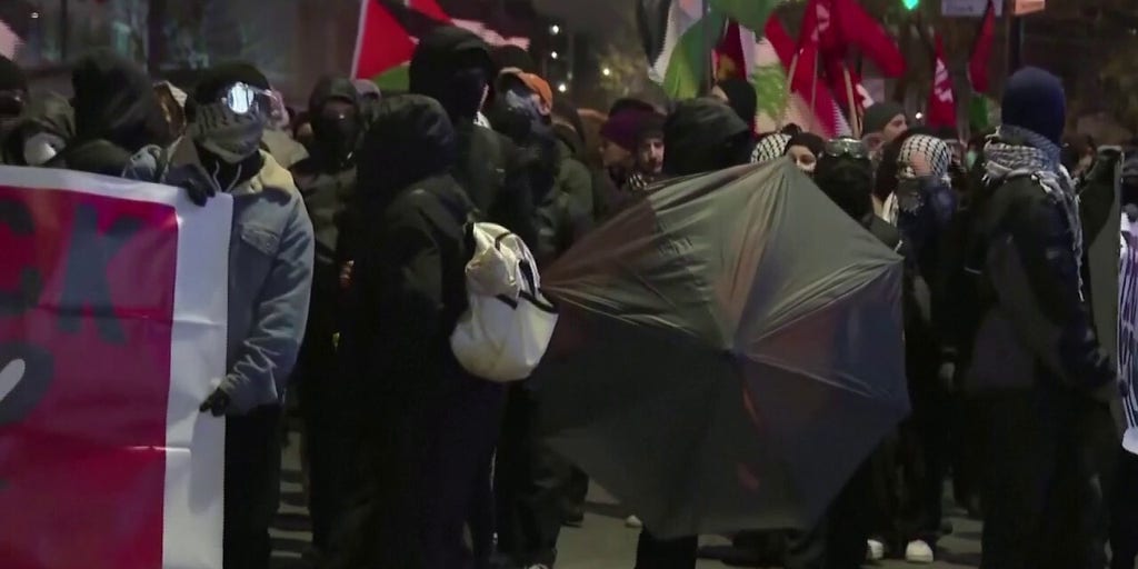 Montreal demonstrators clash with police, set off smoke bombs in destructive protest