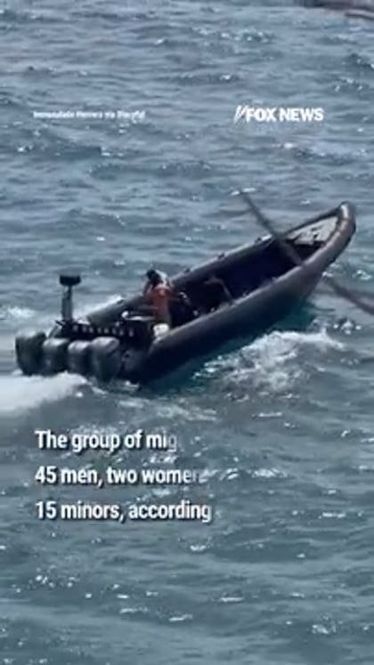 Spanish beachgoers flee after migrant boat arrives on shore