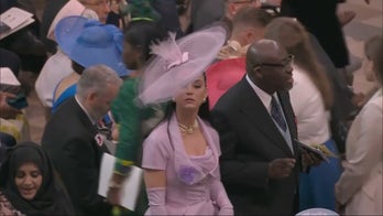 Katy Perry struggles to find seat during Coronation of King Charles