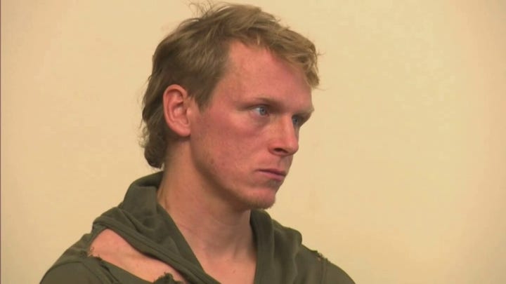 The suspect was allegedly caught on camera breaking the arms off a crucifix in Boston