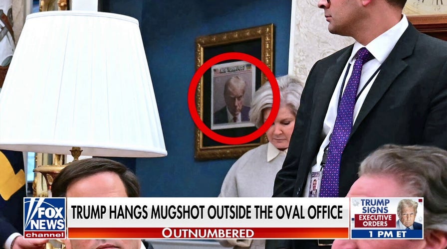 Trump proudly hangs 2023 mugshot outside the Oval Office