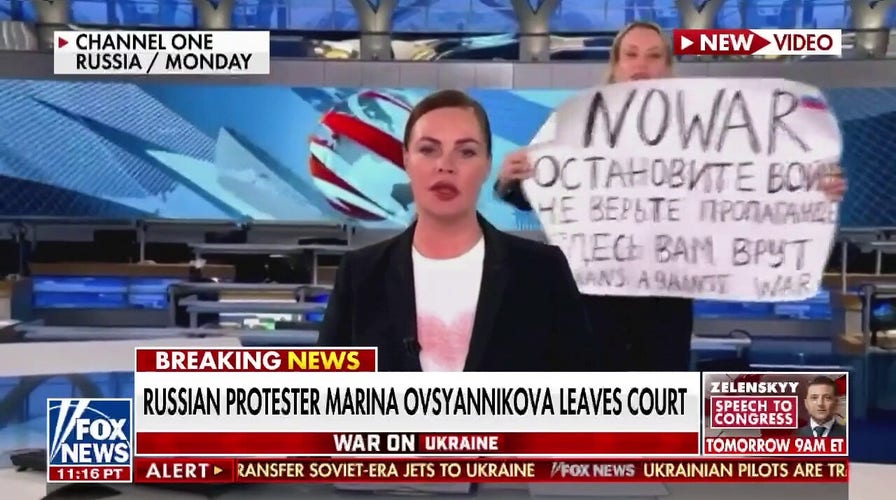  Russian journalist could face decades in prison for anti-war sign