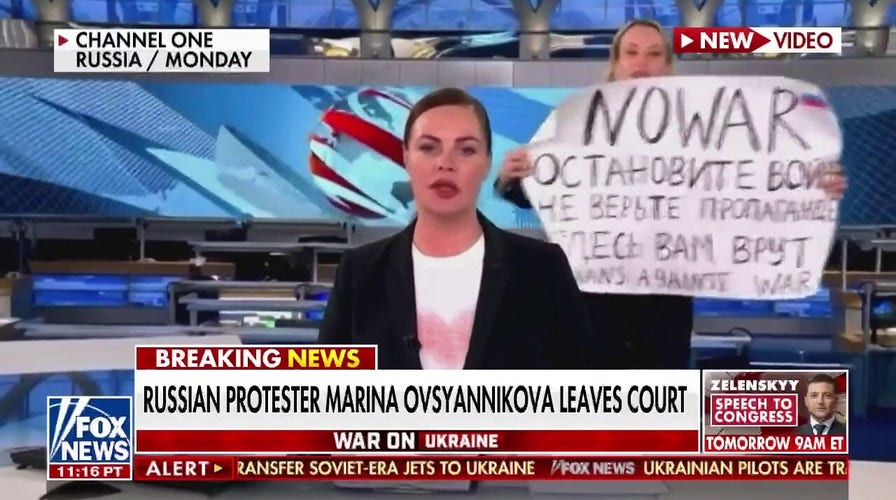  Russian journalist could face decades in prison for anti-war sign