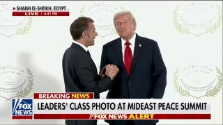 U.S. President Donald Trump and French President Emmanuel Macron share long, awkward handshake - 91