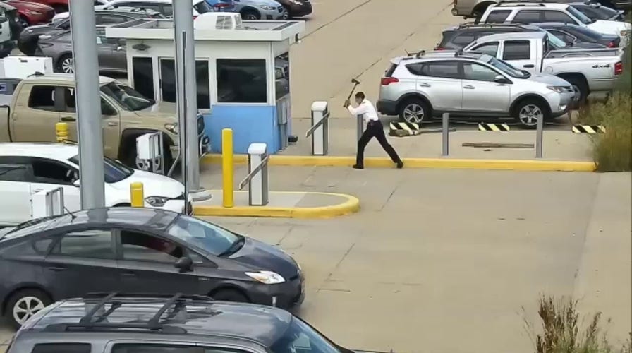Airline pilot takes ax to airport parking barrier