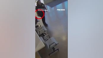 AZ police shoot armed woman in lobby