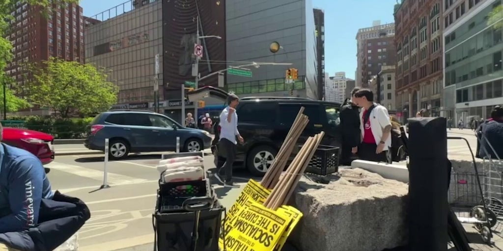 Neville Roy Singham-backed organizations unload protest materials at the May Day demonstration in NYC