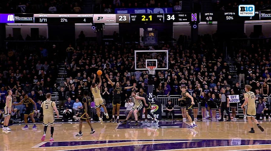 Purdue's C.J. Cox sinks in midjump fadeaway at the buzzer vs. Northwestern