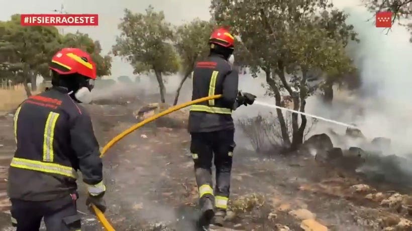Crews race to contain massive wildfire near Madrid as heatwave looms