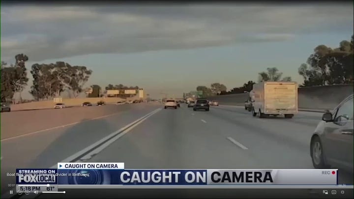 Runaway boat flies over California freeway
