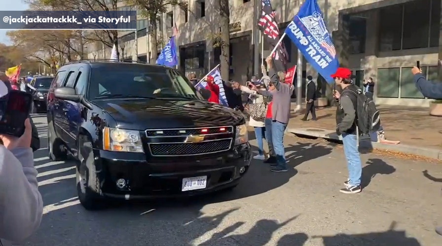 Trump waves to supporters at DC march
