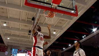Bryce Hopkins converts and-1 off steal, tying the game between St. John's and Harvard