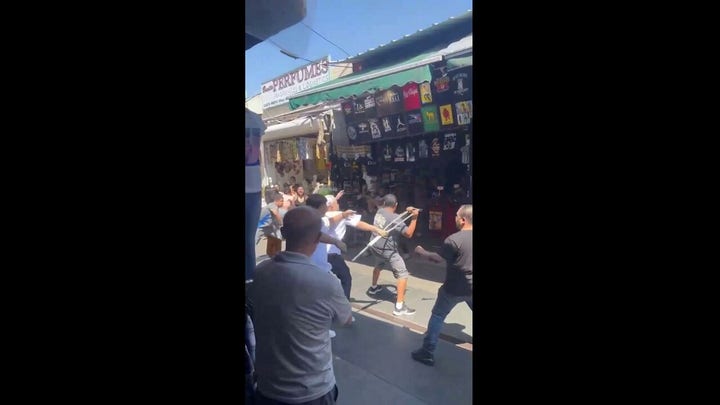 Violent brawl erupts in Los Angeles' Santee Alley