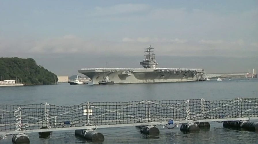 USS Theodore Roosevelt arrives in Guam after coronavirus outbreak on ship