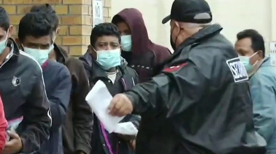 Exclusive footage shows mass release of migrants into US