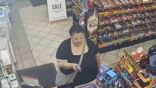 Surveillance video shows woman open fire inside gas station