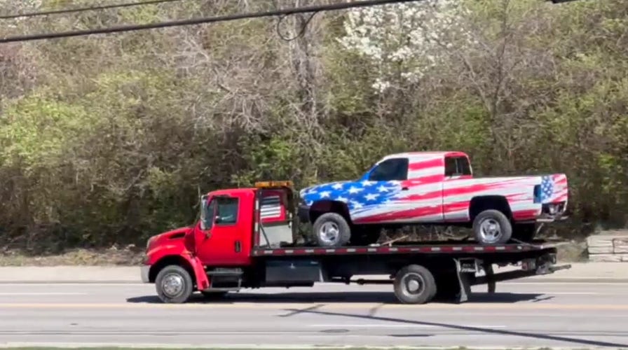 Patriotic high schoolers' new American flag paint wrap driven off the lot for the first time