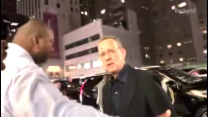 Tom Hanks yells at fan after wife Rita Wilson gets pushed