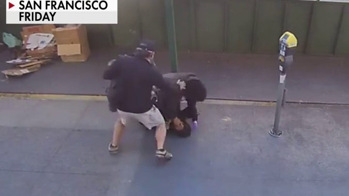 San Francisco police officer fends off attacker with help from bystander