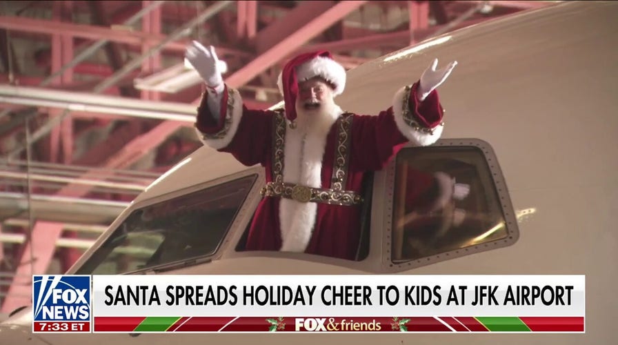 Santa brings holiday cheer to kids at JFK airport